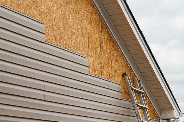 Professional Siding Installation technician working in Millington, NJ